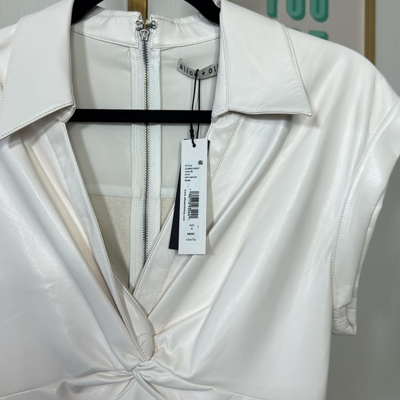 Alice and Olivia
Mila Faux Leather Twist Front Cap Sleeve Dress - Picture 7 of 10